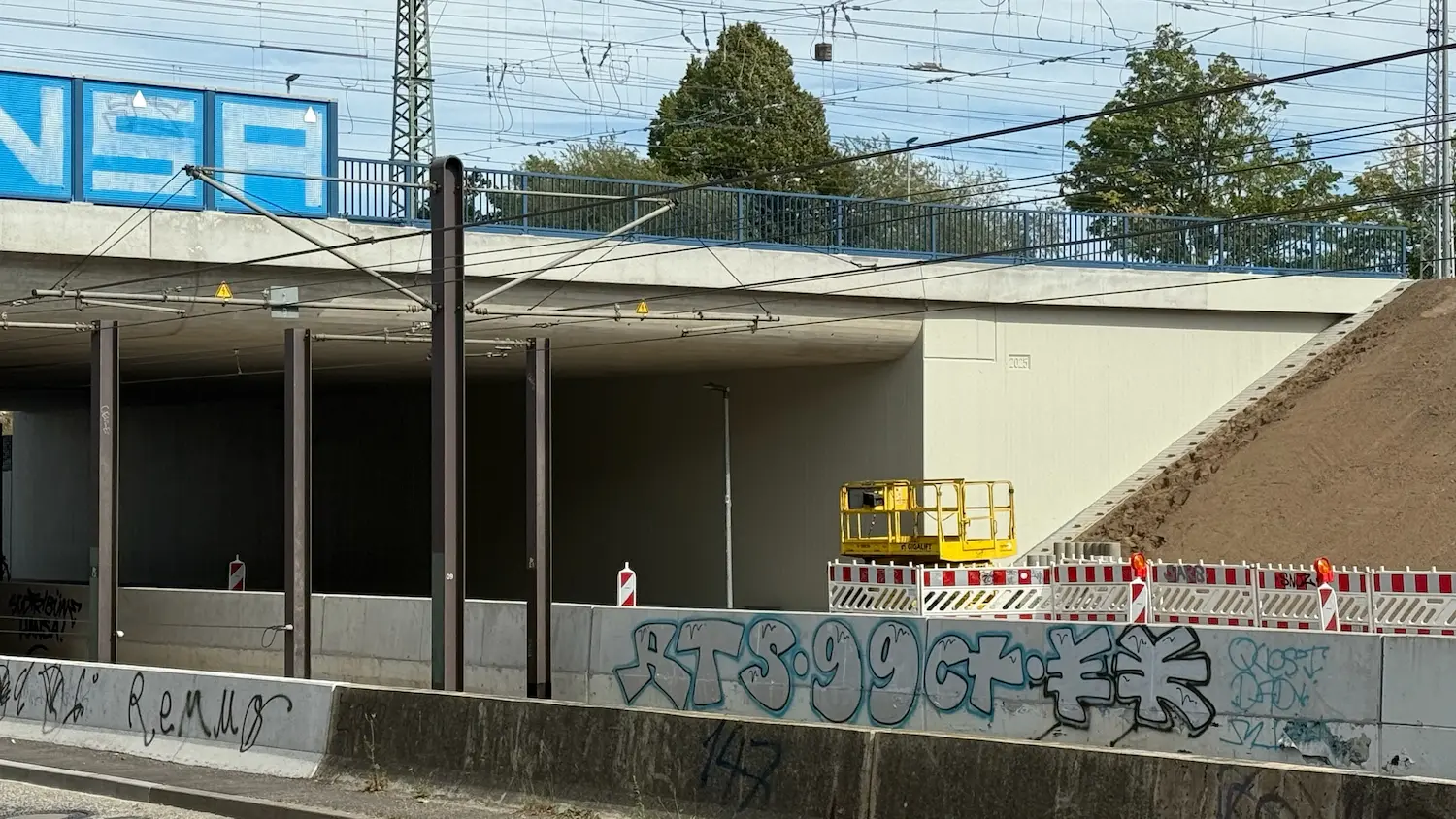 Repaired concrete area at a railway underpass in Rostock after refinishing and graffiti protection
