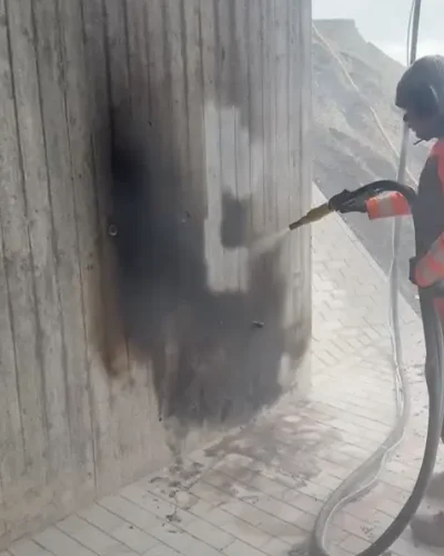 Removal of soot and fire stains on a concrete surface using the JOS process