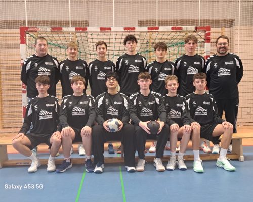 Handballmannschaft aus Altötting in Trikots mit Muschert-Sponsoring